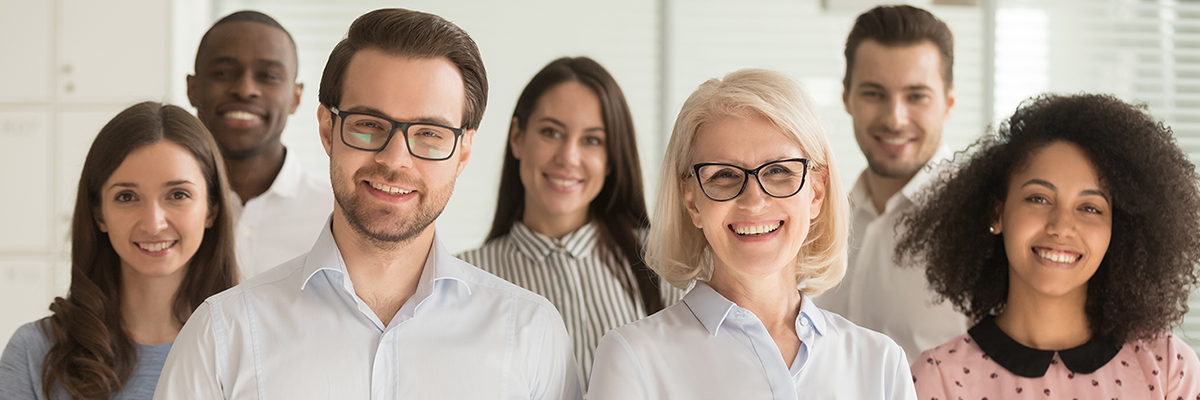 A group of coworkers smiling.