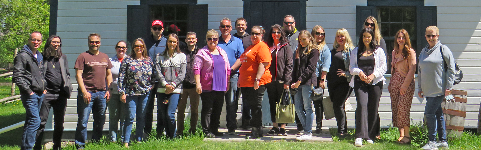 CPA Manitoba staff standing together smiling for a photo